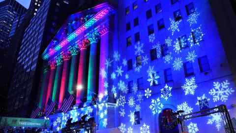 The New York Stock Exchange illuminated by a festive light display