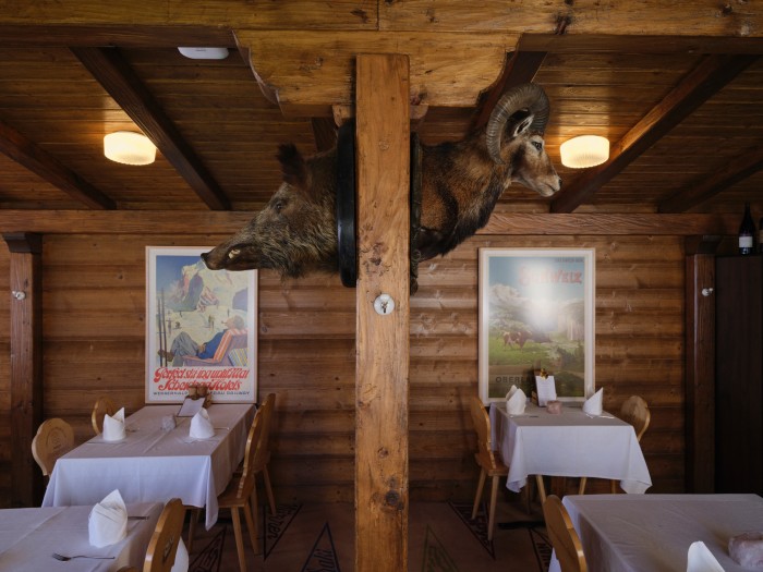 Original vintage Swiss travel posters in the restaurant from 1928 (left) and 1897
