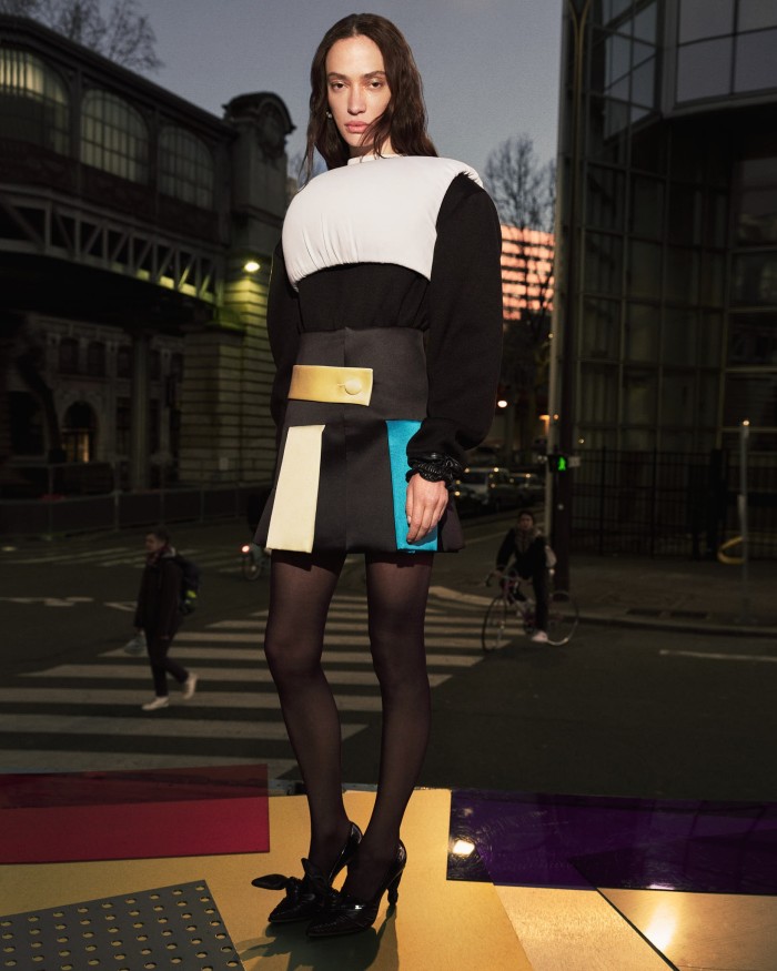 Duran Lantink cotton padded top, €850. Louis Vuitton cotton knit long-sleeved top, £2,135, silk structured skirt, £2,475, and leather LV Bow pumps, £940. Calzedonia elastane tights, £7.99