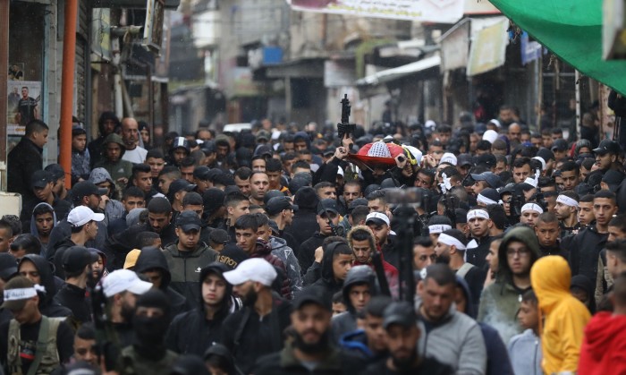 Mourners carry the body of a teenager at Balata refugee camp earlier this month