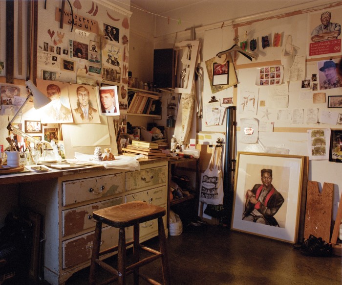 Melissa Dring’s studio, including some of her traditional portraits as well as her forensic sketches