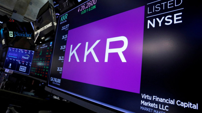 Trading information for KKR & Co is displayed on a screen on the floor of the New York Stock Exchange 