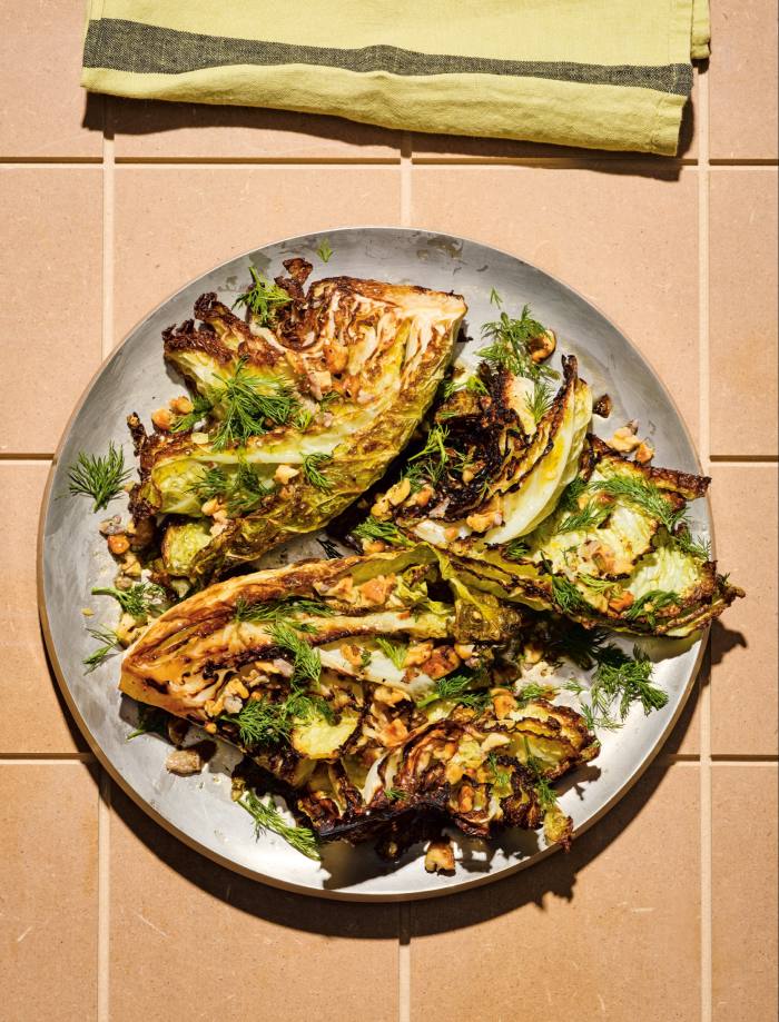 Fall-apart caramelised cabbage smothered in anchovies and dill