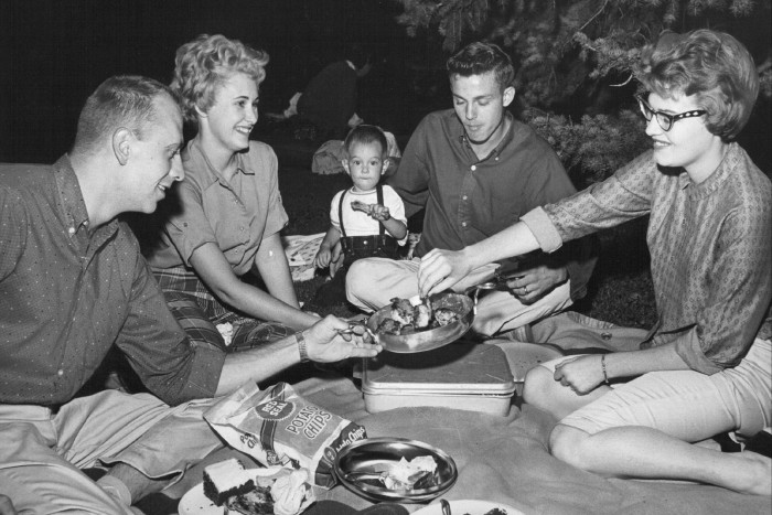 Families in the 1960s enjoying fried chicken wings