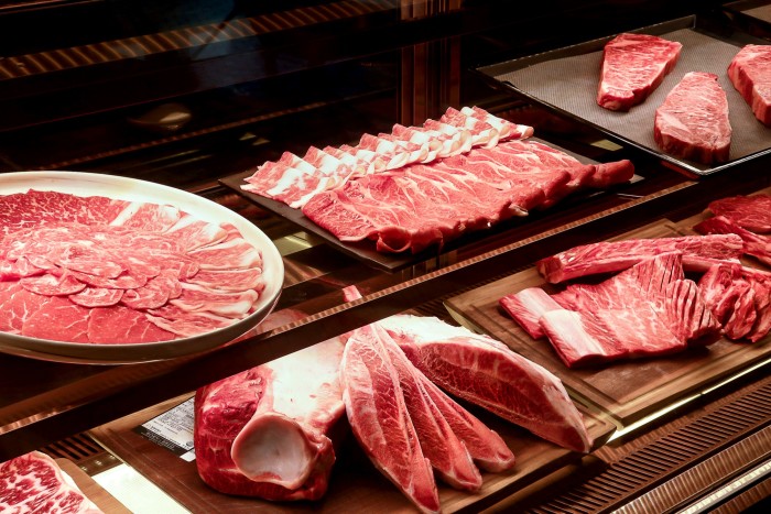 The marbling on the meat is achieved through a diet high in grains and corn, rather than grass