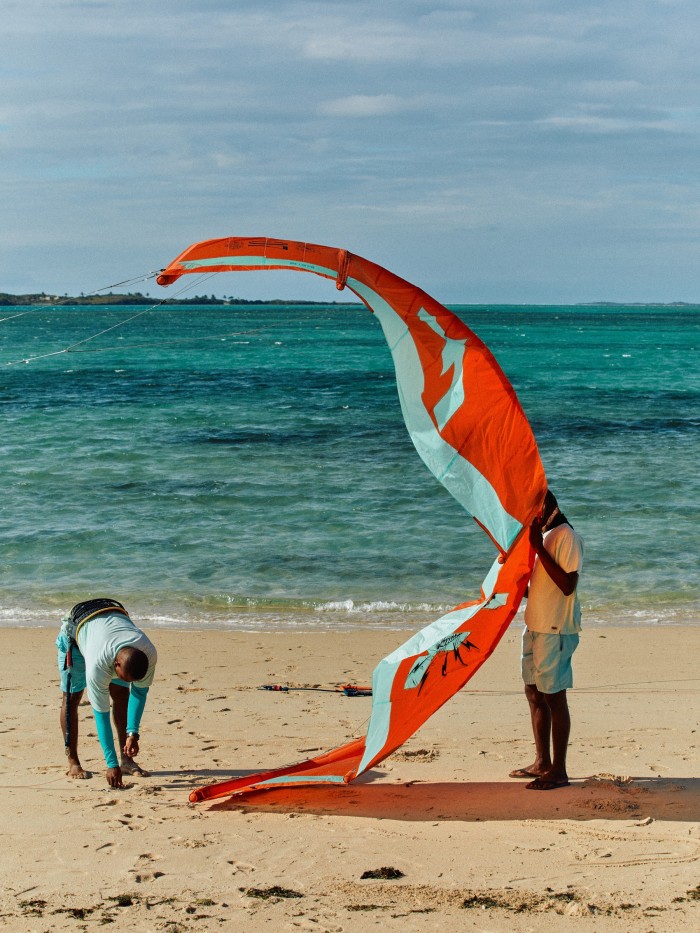 Kitesurfing instructor Jonhson (left), with his assistant