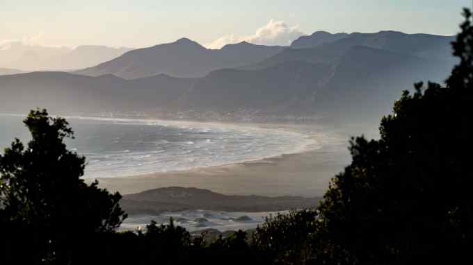 A coastal view where the sea meets the beach