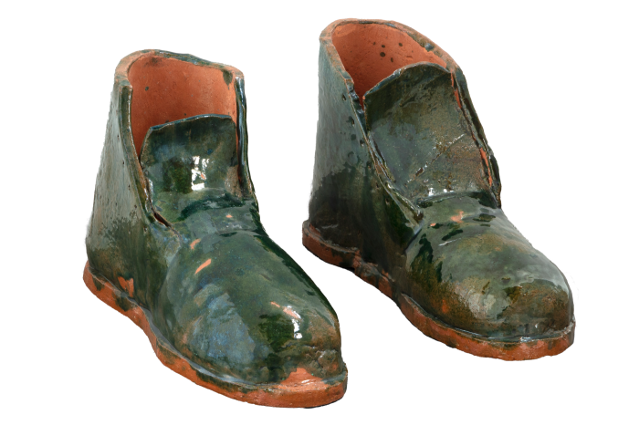 Green-glazes ceramic boots