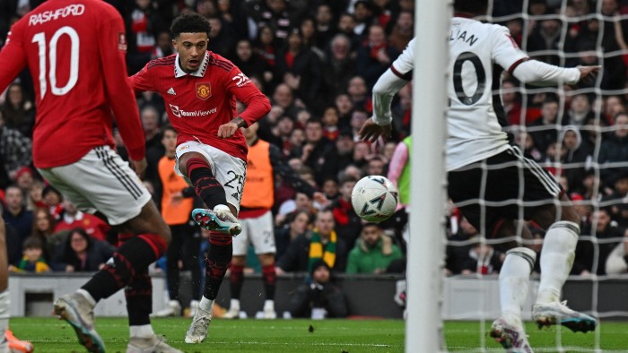 Manchester United forward Jadon Sancho takes a shot during the FA Cup match with Fulham on Sunday at Old Trafford