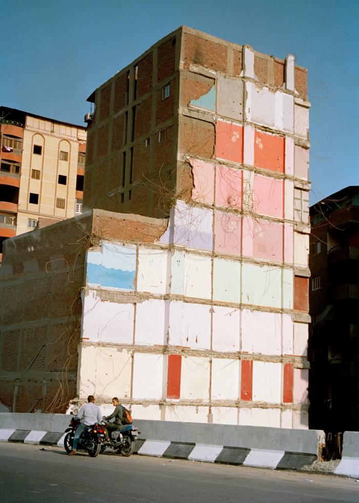 A partially demolished building on the side of the Ring Road