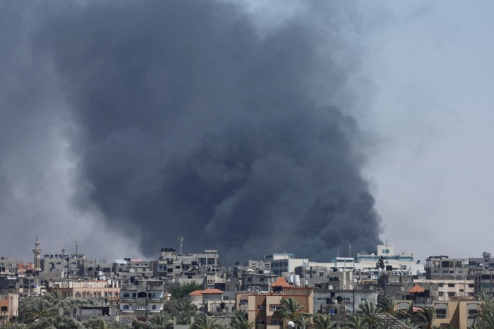 Smoke rises during an Israeli air strike on Rafah on Friday