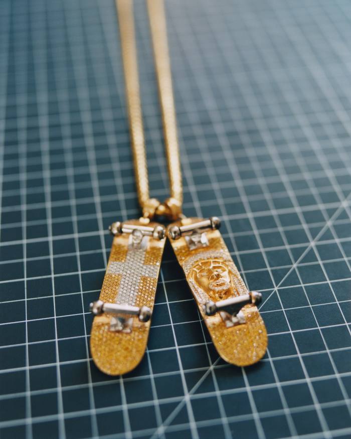 Jacob & Co gold and diamond skateboard pendant chain