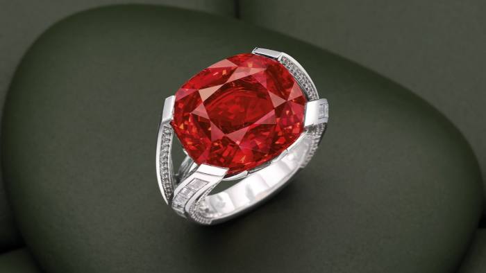 A Louis Vuitton ring featuring a red spinel