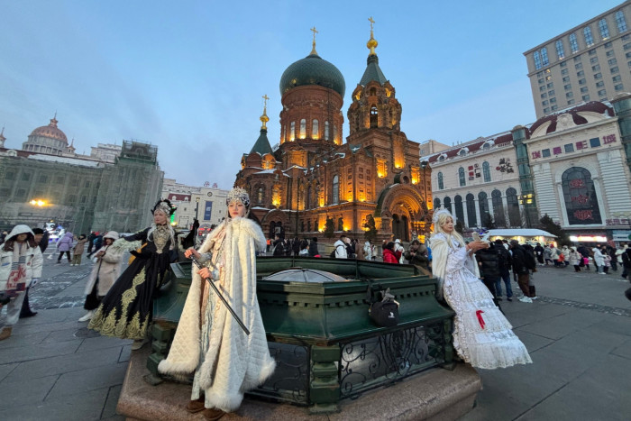 Chinese influencers in front of Sophia Cathedral in Harbin