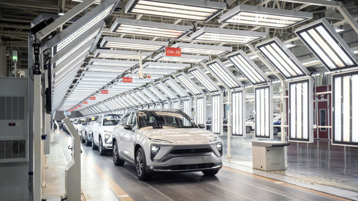 Nio Inc. electric vehicles are rolled off the production line during an event at the automaker’s factory in Hefei, Anhui province, China