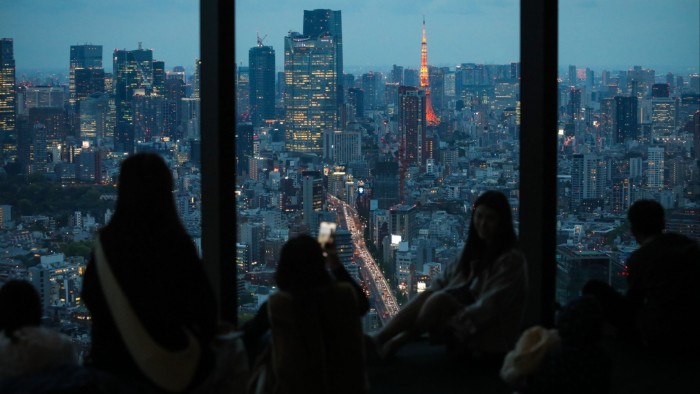 People look out over Tokyo. Business is reshaping, finance will follow and in historic realignment, runs the logic of avarice, there is always historic opportunity