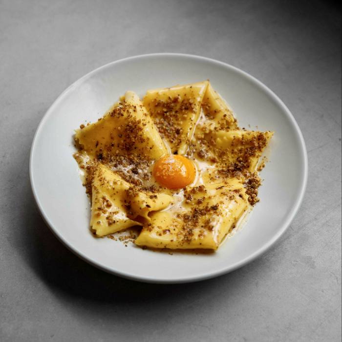 . . . and sample the restaurant’s iconic silk- handkerchief pasta with walnut butter and egg yolk
