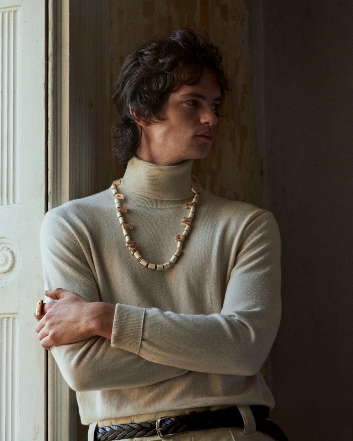 Loro Piana cashmere turtleneck, £1,215, and cotton Reigna trousers, £615. Giorgio Armani woven leather and rayon belt, £450. Clare Corrigan bone and riverbed-abalone Wild is the Wind necklace, £2,500, on request at clarecorrigan@gmail.com. Sian Evans gold and agate Burn Anne Ashurbanipal ring, £2,900