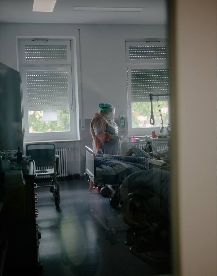 Dr Katharina Lenherr at Rosenheim’s ICU. She admits that at the start she ‘nearly passed out’ from having to wear so much PPE