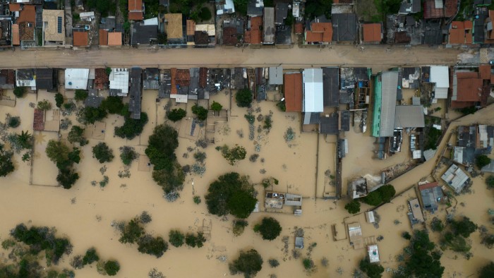 Flooded homes after heavy rains in Citrolandia, Brazil. With just 13% of CEOs having incentive plans linked to decarbonisation, the message is clear: climate change has little strategic impact