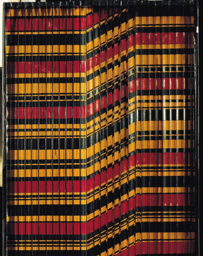 Venenian blinds painted in red, black and yellow horizontal stripes