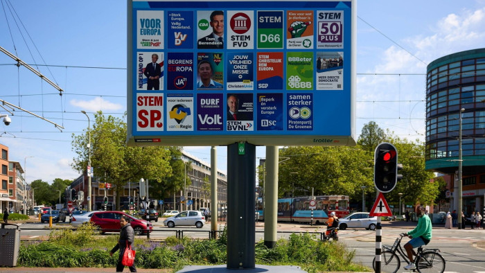 A billboard showing the campaign posters of different parties who will participate in the European elections in The Hague