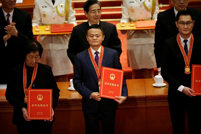 Jack Ma in 2018 at a ceremony in Beijing to mark the 40th anniversary of China's opening up. Mr Ma fell foul of the authorities after giving a speech in which he was critical of state-owned banks and regulators in October last year