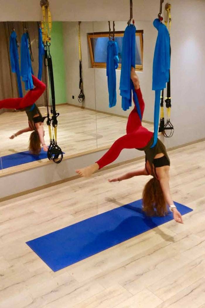 Aerial “anti-gravity” yoga stretches out the muscles after skiing and interval-training