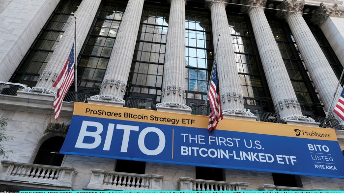 A banner for the ProShares Bitcoin Strategy ETF hangs outside the New York Stock Exchange