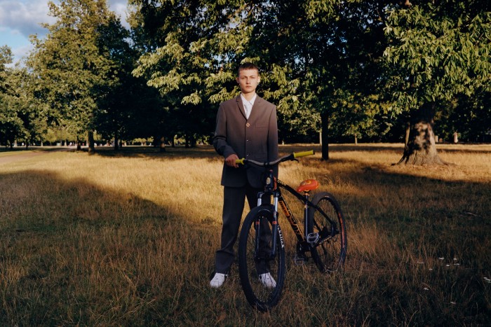 Andrew Keeshan, BMXer, wears Louis Vuitton wool jacket, £2,250, matching trousers, £715, and cotton shirt with tie, £715. Nike leather Blazer Low trainers, £80