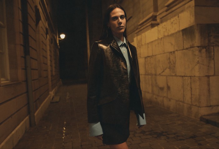 Bally leather jacket, £2,300, and wool skirt, £530. Charvet cotton shirt, €445. Bijouterie Lignon earrings, model’s own