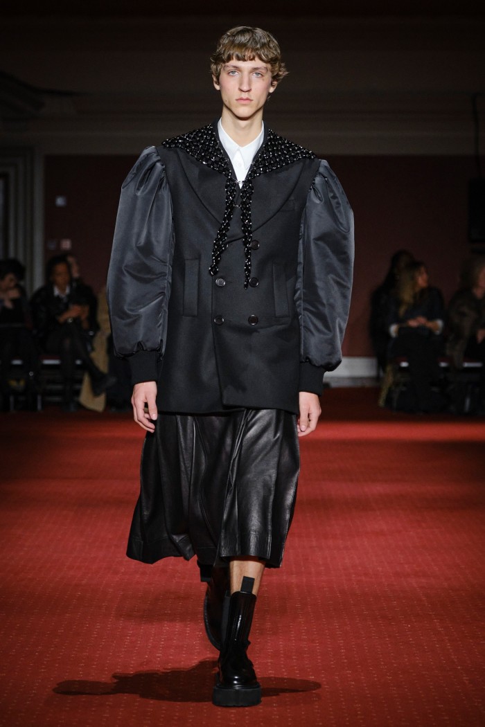 Simone Rocha wool peacoat, £1,595, cotton poplin easy shirt, £450, and black Nappa leather pleated kilt, £2,200