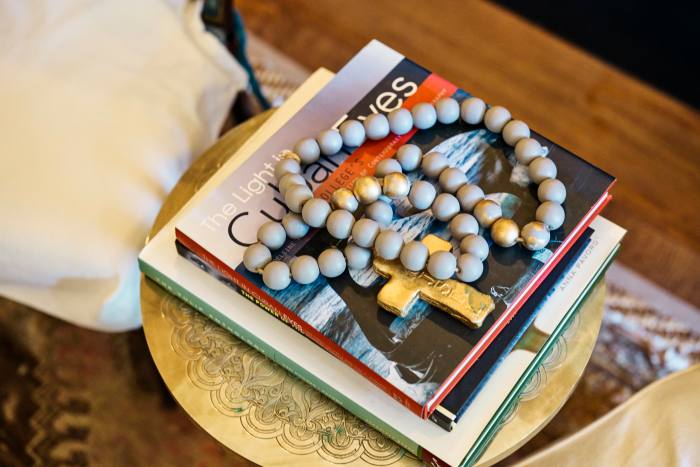 A rosary and a book on Cuban art