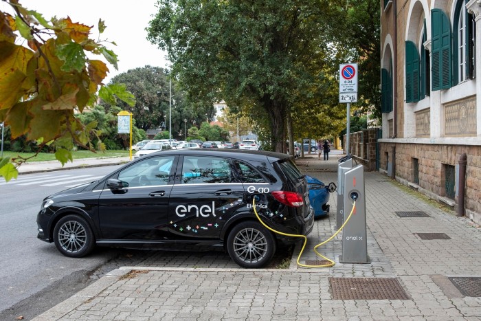 Mercedes-Benz E-Go car share service recharging on Enel X charging station in Ostia, a neighbourhood of Rome.