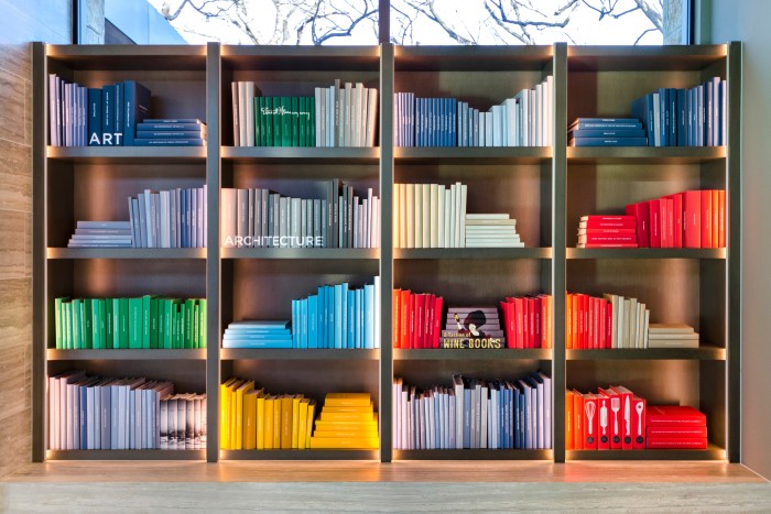 A colourful library curated for a client by Juniper Books