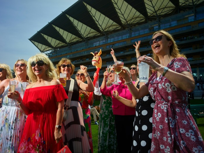 Racegoers at Ascot in early spring this year