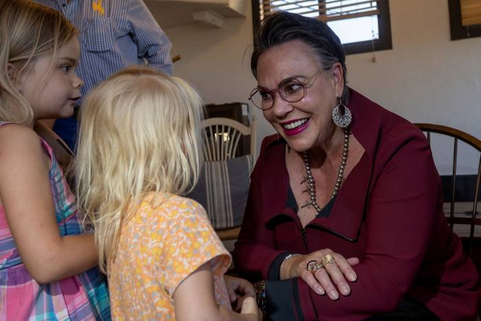 Harriet Hageman speaks with children at a meet-and-greet in a coffee shop in Pinedale, Wyoming, Friday July 8 2022 