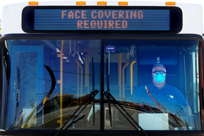 A bus in Portland, Maine, displays a sign requiring passengers to wear face masks. Marketing executives have leapt into action to capitalise on anxiety about using public transport