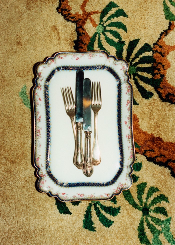 A 1900 Limoges porcelain tray and vintage Christofle cutlery
