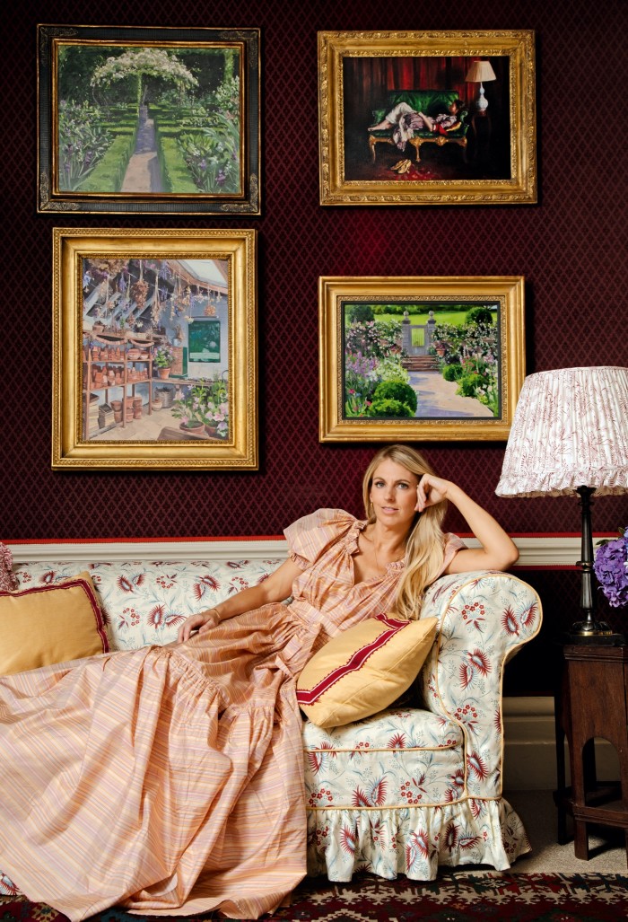 Phoebe Dickinson photographed at Dickinson gallery, London; the sofa is in Octavia Dickinson linen Edie print in yellow