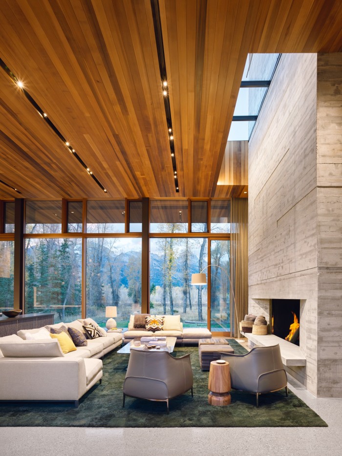 This house by CLB Architects on the banks of the Snake River, near Jackson Hole, Wyoming – built for a Californian couple – is set 6ft above ground level to maximise views, as seen from the double-height, open-plan living space