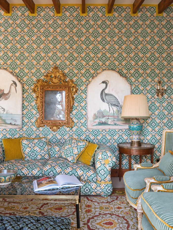 The Grand Suite “Antonio Torrandell” with an 18th-century Spanish mirror and antique heron paintings from Stockholm