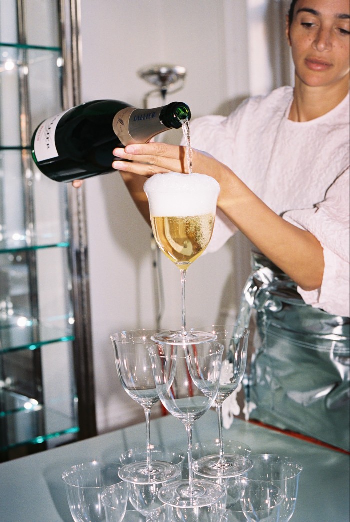 Pouring a champagne tower of Lallier Blanc de Blancs