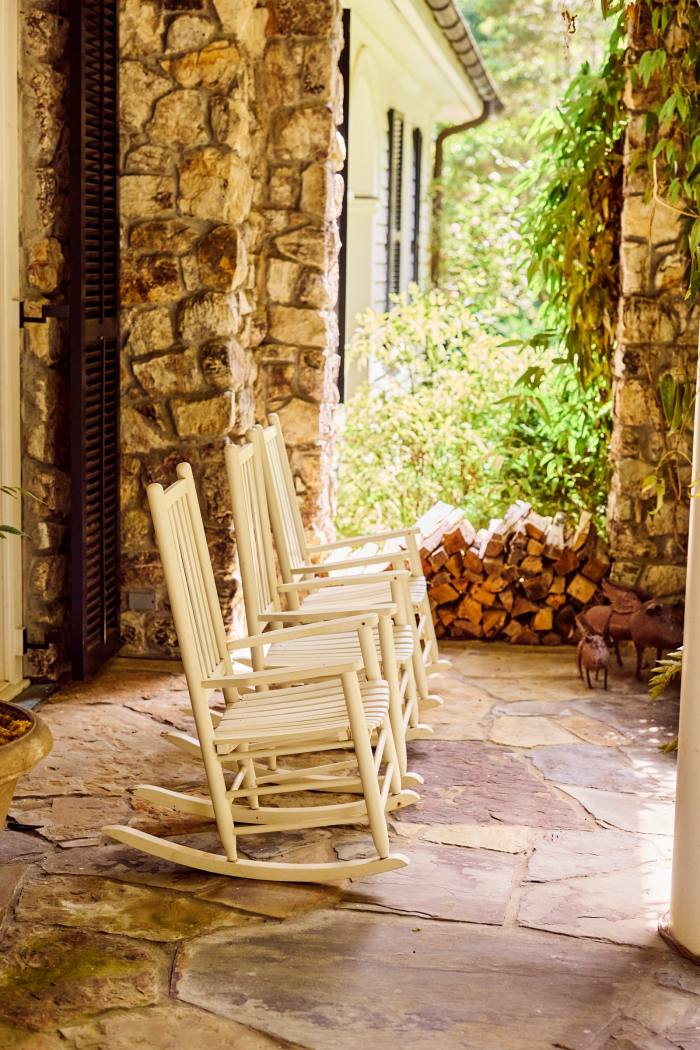 Rocking chairs on her front porch