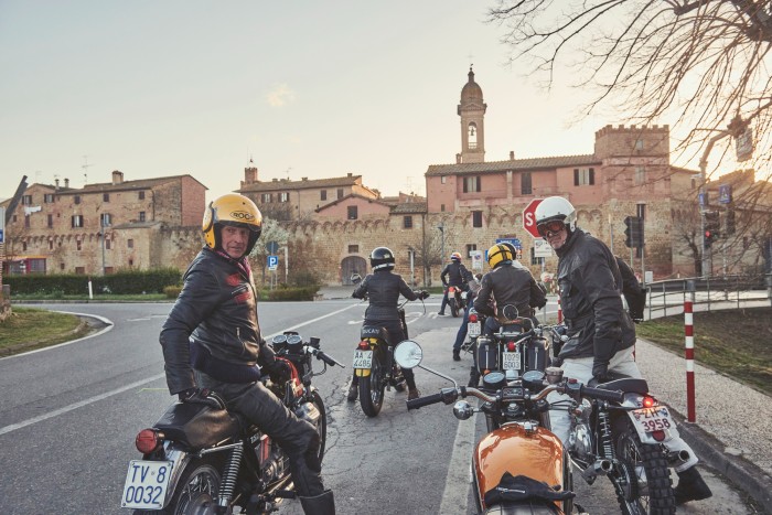 The party regroups after a descent through the Tuscan hills