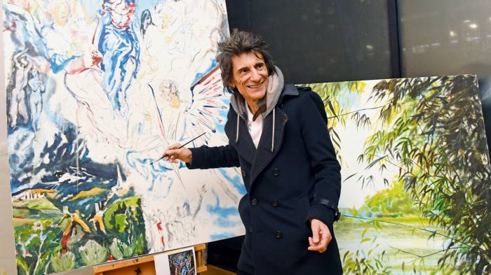 Wood painting at a private viewing of the Ronnie Wood Collection exhibition in December 2019