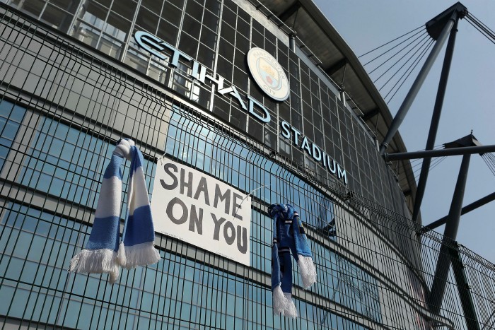 A protest sign against the new league, reading ‘Shame on you’ outside Manchester City’s Etihad stadium on Tuesday