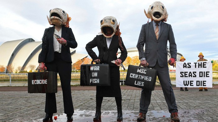 Ocean Rebellion activists stage a protest against deep-sea fishing in Glasgow on Thursday