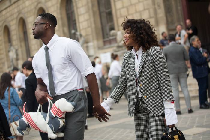 Dwyane Wade and Gabrielle Union outside the 2017 Thom Browne show, Paris
