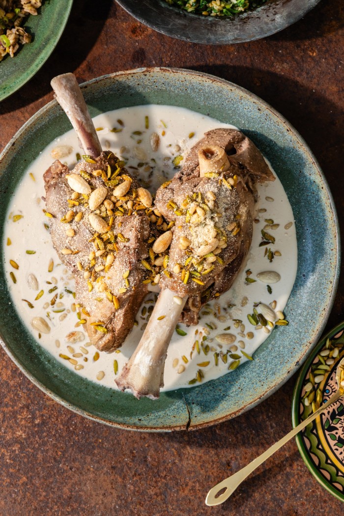 Lamb shanks with almonds, pistachios and pine nuts